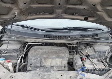 2012 Honda Odyssey Ex-L z USA, uszkodzony, nr VIN 5FNRL5H64CB131510